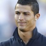 Real Madrid forward Cristiano Ronaldo gestures to fans before their soccer friendly match against the Los Angeles Galaxy in Pasadena